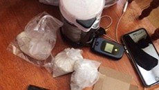 Authorities found heroin hidden in chips bags at the heroin mill.
