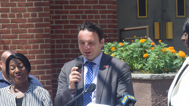 Sayegh announces his road repair plan in front of the St. Bonaventure's Church on Ramsey Street.