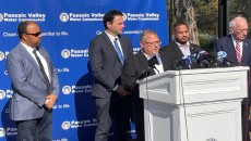 Lou Amodio, acting business administrator for the Passaic Valley Water Commission, announces the lifting of the boiled water advisory on Friday. He is flanked by mayors of Paterson, Clifton and Passaic City and commissioners from the PVWC.