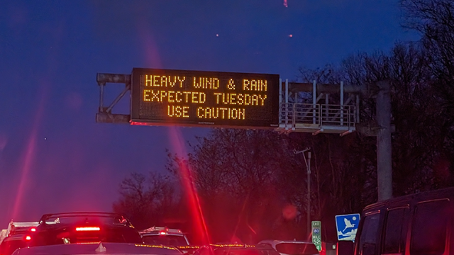 heavy-wind-and-rain-highway-sign